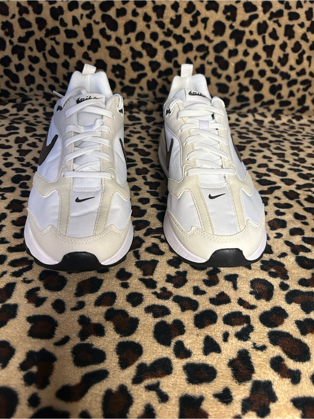 Nike White Sneakers with Black Swoosh and Beige Overlays